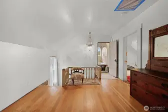 The upstairs landing is large enough for an office or second sitting area.