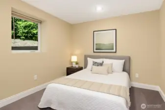 Virtually Staged. Bedroom concept for one of the lower rooms.