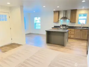 Looking at the kitchen and eating area from the living room.