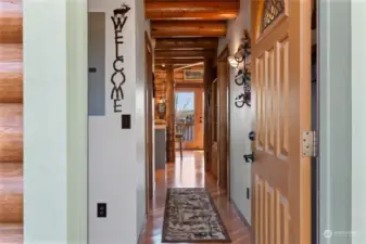 Upon entering the house, you will find the hallway where the downstairs bedroom and bathroom are located of off.  At the end of this hallway.....paradise!