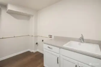 Laundry room with utility sink and counter