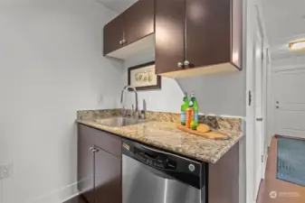 Kitchen with granite counter tops & Dishwasher