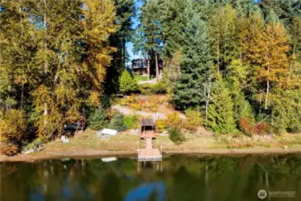 Beautiful property with 280 ft low-bank waterfront on the serene Hidden Lake!