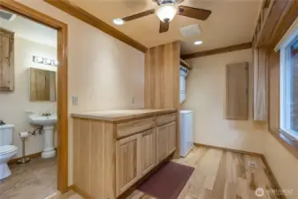 Utility room connects to the primary bath