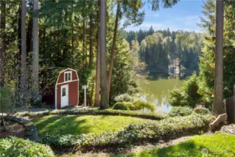 Barn/shed can store your garden tools and water toys. There's a tall storage room on the side of the garage that's perfect for your paddleboards, too!