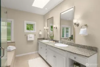 Bright Primary Bath with skylights, double vanity, soaking tub, large shower plus a discreet, separate room for the toilet.