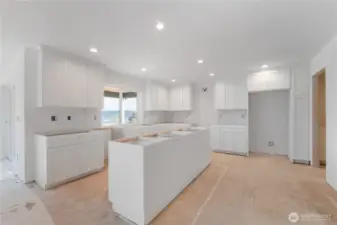 Kitchen will have quartz, full height tile back splash & range vent.
