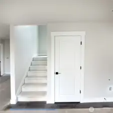 Loads of storage under the stairwell.