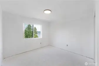 Bedroom 1 upstairs with views of the Hood Canal.