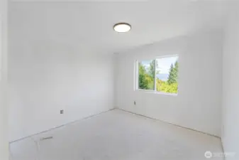 Bedroom 2 upstairs with views.