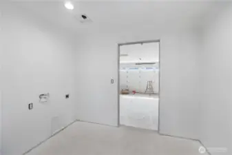Oversized utility room on main floor.