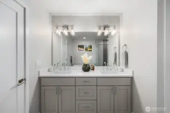 Dual sinks in the primary suite.