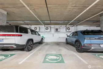 This home comes with two reserved parking spots, one is EV (240v)! Conveniently located on the main level (2nd floor) of the parking garage.