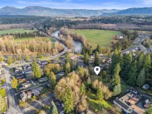 Aerial view featuring Stilliguamish River Valley, and a secluded level property view.