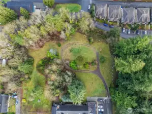 Arlington view property with full property image detailing level land and trees on both sides.Bluff on upper part of image.