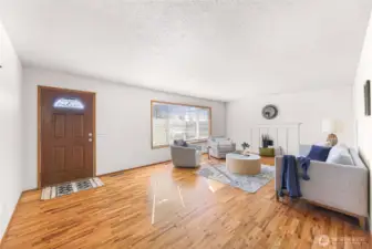 Large living room with original oak floors