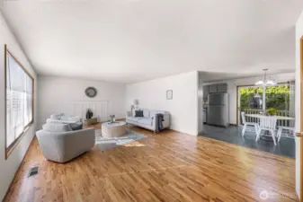 Open to dining room and kitchen.