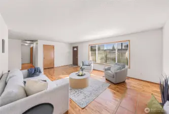 Living room also features cedar lined coat closet