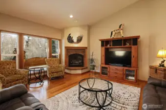 Living room w/cozy fireplace.