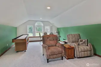 Flex room above garage.