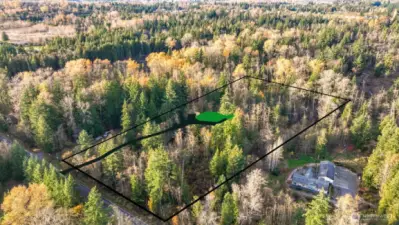 Aerial view showing approximate property lines, proposed driveway & building site. Nicely set back off the road!