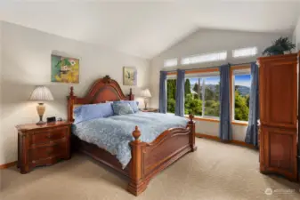Cascade mountain views off main-floor primary bedroom.