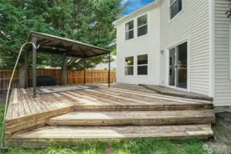 Expansive deck with gazebo is perfect for entertaining.