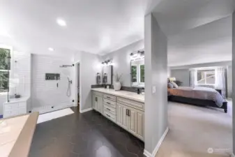 Beautifully remodeled primary bathroom with heated floors.