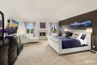 The luxurious Primary bedroom features a cozy fireplace, large walk-in closet, adjacent office/gym & a five piece bathroom. Enjoy the Mountain VIEW!