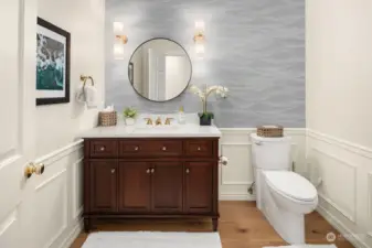 Main floor remodeled powder room.