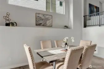 Two tiered dining and living space (model home lot 24)