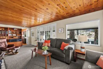 A beautiful tongue-and-groove pine ceiling evokes a sense of nostalgia and timeless charm.
