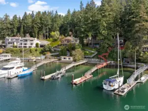 This quaint retreat is tucked among the pines offering stunning views of marine activity.