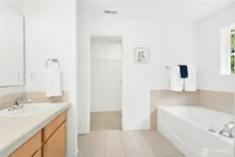 Walk-in primary closet in addition to huge double closets in P bedroom