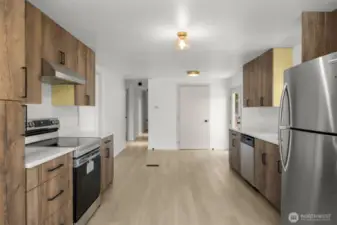 Gorgeous galley kitchen looking north toward hallway and 3 bedrooms