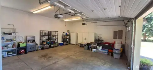 Oversized two car garage with bonus room above.