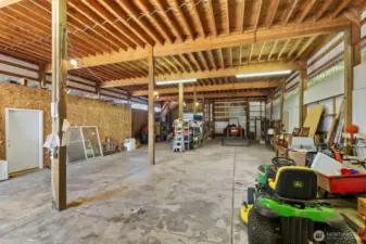 14 ft doors on both ends.  Interior RV 30 amp hookup and sewer connection.