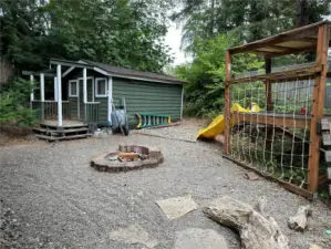 Side yard showing large storage shed