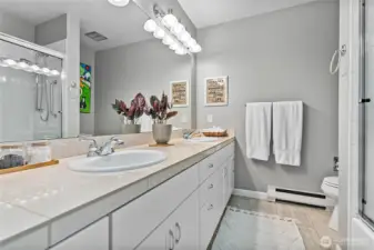 Guest bathroom with bath and shower