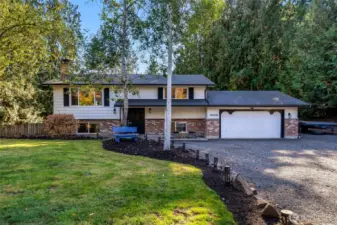 Half-acre corner lot in Trombley Hill with easy access to downtown Monroe!