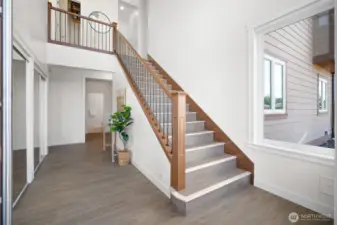 spacious entry with dual coat closets.