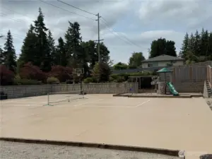 HOA's Private Recreation Court.  Shared between only 19 homes and their guests, this recreation area includes pickleball, basketball, swings, big toy, bocce ball, and open area.
