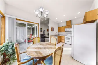 Natural light from large windows and private balcony