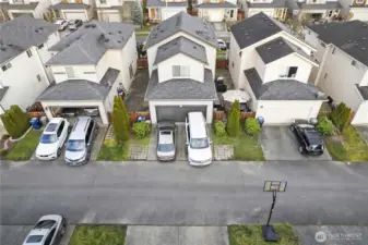 Alley access to 2 car garage & driveway parking
