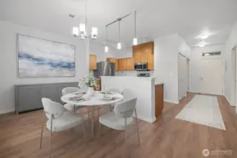 Dining area open to the living space, creating a comfortable spot for meals and conversation.