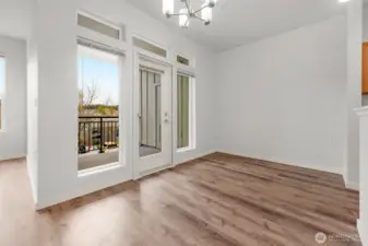 Dining area opens up to the covered deck along with a storage closet.