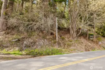 Seller placed a stick poles in the approximate vacinity of the lot line. 50' Frontage.