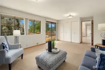 The family room boasts even more storage, as well as a second sliding door to the back deck.