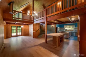 From the front door, looking to the left is the dining area with French doors leading out to the side deck.