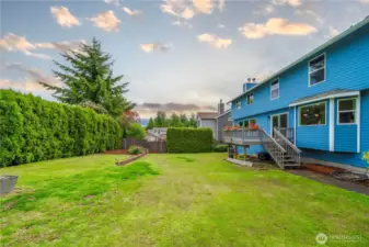 The fully fenced level back yard offers plenty of privacy.